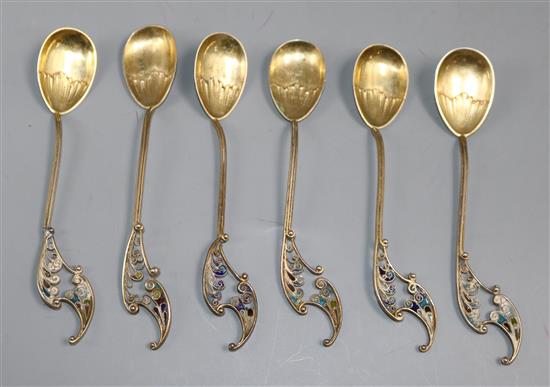 A set of six Swedish parcel gilt white metal and plique a jour enamelled coffee spoons.